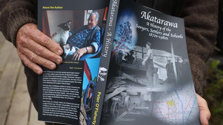 The book cover for 'Akatarawa: A history of the Sawyers, settlers and schools' held.